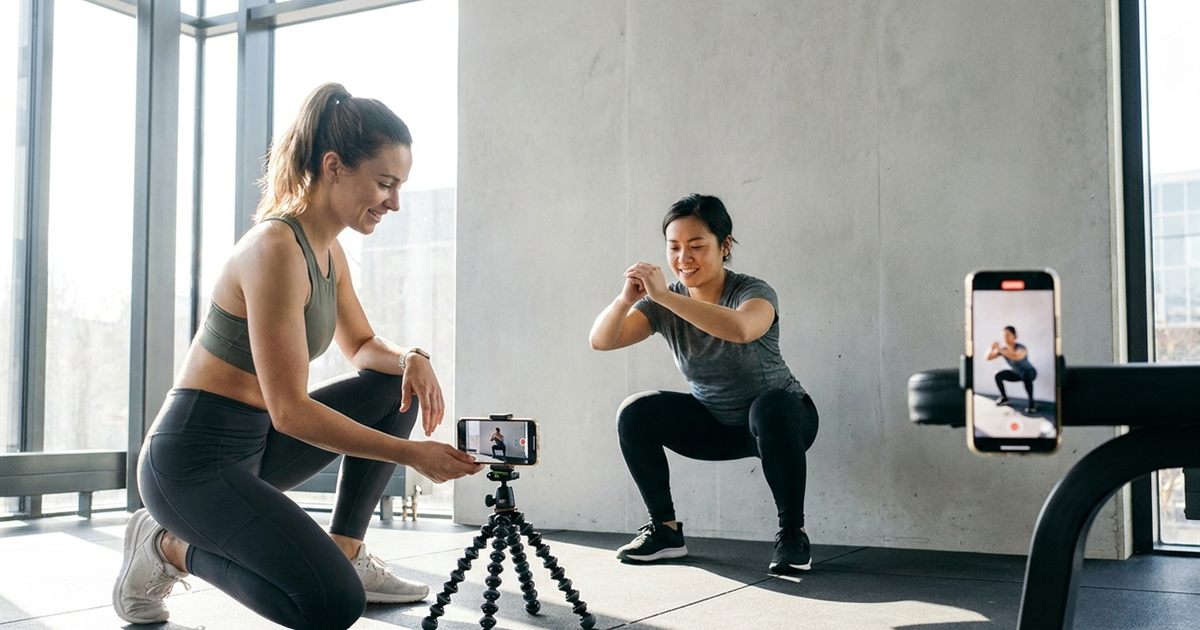 Fitness coach reviewing a short looping exercise demonstration GIF of a squat made with a free online GIF maker
