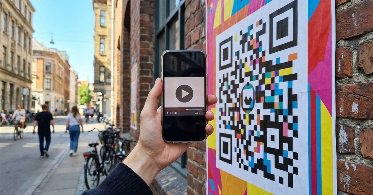 Smartphone scanning a QR code on a poster that opens a YouTube video