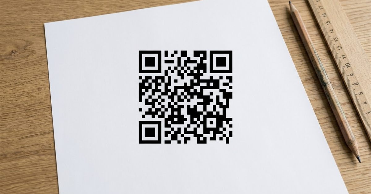 Printed QR code with a clear white margin around it on a poster next to a QR code generator preview showing the quiet zone