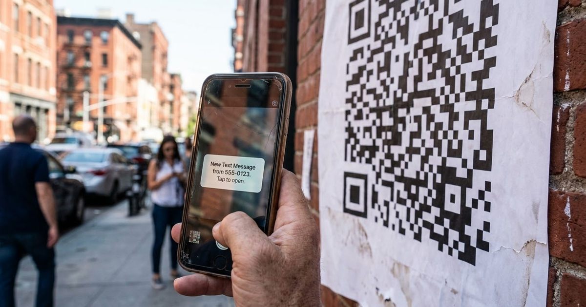 Smartphone camera scanning a printed QR code on a poster and opening a text message with the number already filled in